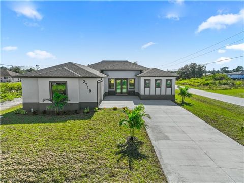 Photo of 2719 59th ST W, LEHIGH ACRES, FL 33971 (MLS # 2025019737)