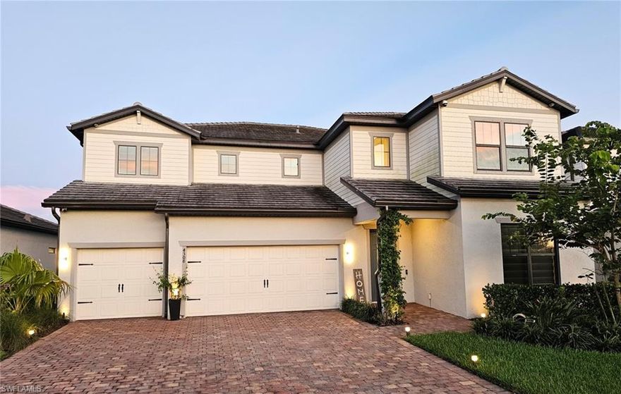 Lake View with large pocket doors and kitchen windows! This stunning single-family home in Ave Maria, FL was newly built in 2022 and offers a spacious and luxurious living space. With 4 bedrooms and 4 bathrooms spread over 4,262 sq.ft. of finished area, this two-story home is perfect for families or those who love to entertain. A minisplit A/C is installed in the 3 car garage, complete with epoxy flake floors and a garage sink. Most rooms have upgraded recessed ceiling lighting and large modern energy efficient fans. Two dens for those who work at home and a separate formal dining area.