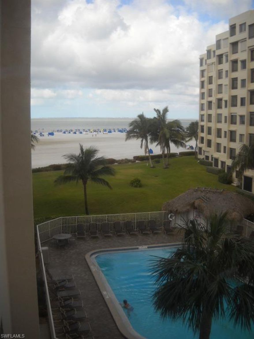 Just reduced $20K. Beautiful views of the widest sugar sand beach!  Completely renovated in 2008. Kitchen is fabulous with granite counters, trey ceiling. Custom mirrors in dining/living areas. Hot water heater two years old. AC new in 2008, also. Ceramic tile. Wonderful, renovated entrance foyer adds some extra space. Corner unit means light in the guest bedroom, too. Close to shopping, and dining! Comes with an undercover pkg space #68. Excellent value!