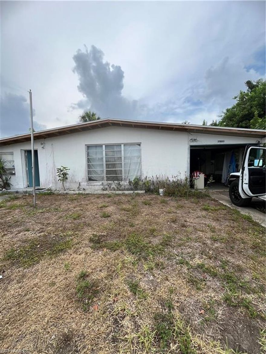 INVESTOR SPECIAL! Call today to schedule your private showing of this Hurricane Ian damaged home. Cleaned out down to the 2 x 4s, this concrete block home is ready for you to make it your own! Current floorplan includes 2 bedrooms, 1 bath, with nearly 900 sq ft under truss. BRAND NEW ROOF recently installed!!! Home features an expansive one car garage with built-in workshop. As-is cash sale only due to condition of home. This home has HUGE potential! Great area with excellent schools, a short drive to local shopping center, mall and hospital, with Charlotte Harbor nearby! Area comparables should place this home in its renovated condition in the 240K range! At this price, it's time to MOVE!