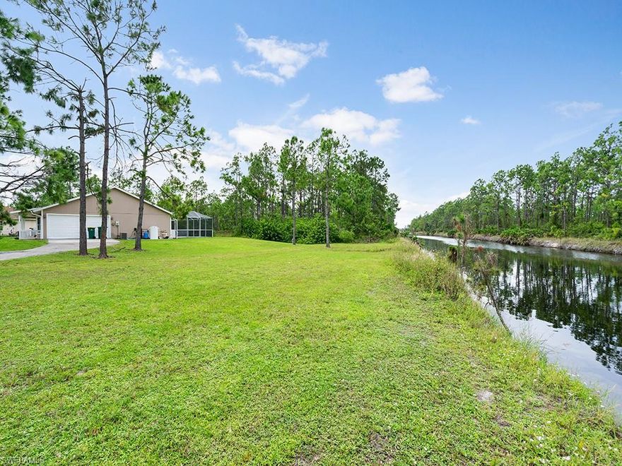 Beautifully finished 3/2 pool home in Golden Gate Estates. This home has been freshly painted inside and out, it also features granite counters, tile throughout the entire house. The front of the home has a porch with railing for your enjoyment, and the enclosed pool allows ample view of the 3+ acre property. The unit also has a separate laundry room from the garage. This home is located close to shopping, the I-75 and Sabal Palm Elementary, Cypress Palm Middle, and Palmetto Ridge High School.