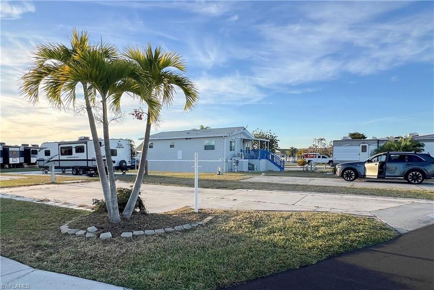 Soak up the best of what Florida has to offer! Welcome to Palmetto Palms where YOU own your land. This beautiful lot is located just a short stroll from the main clubhouse, new pavilion, and swimming pool. This lot can accommodate and ASHI tiny home, park model, camper, RV, double wide manufactured home, etc. There are 5 sets of community showers and shared laundry facilities on-site. There’s so much to do in this community with just a short stroll to the amenities such as shuffleboard, volleyball, pickleball, tennis, horseshoes, and a number of other community activities, and even a second swimming pool. This lot is located in the non-pet section and golf carts are allowed. Palmetto Palms is located just 3 miles from Times Square Fort Myers Beach, and just 1 mile from Bunche Beach on the Gulf where you can go shelling, rent kayaks, and watch amazing sunsets over Sanibel Island. Walk to shopping, restaurants, the beach, and more. Welcome to endless summer!