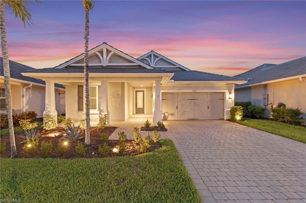 Photo of 10586 Tidewater Key BLVD, ESTERO, FL 33928 (MLS # 226018871)