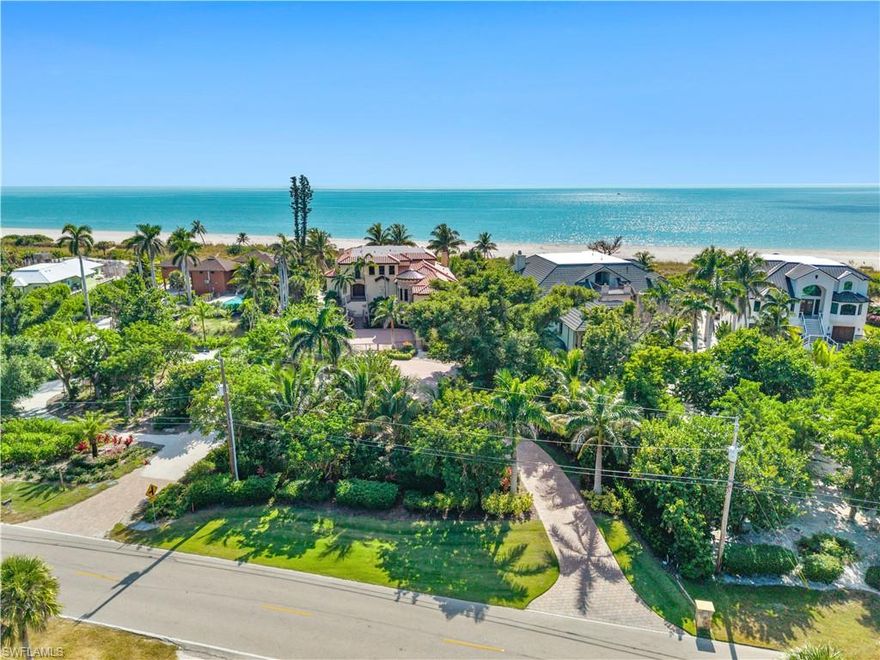 Discover unmatched luxury & privacy in this breathtaking Gulf-front estate on Sanibel Island’s covetedWest Gulf Drive. Set on 1.64 gated acres, this island masterpiece offers panoramic views, private sandybeach access, & an extraordinary design that radiates sophistication & comfort. Step inside to discover agreat room & kitchen area designed for entertaining, complete w/a cozy fireplace & an elegant winecellar. Adjacent to the living space is a rich, inviting library den—perfect for unwinding in style. Theseamless indoor-outdoor flow leads to an elevated outdoor oasis featuring a stunning negative-edgepool, spa, built-in fireplace, outdoor kitchen, & expansive lanai areas, all overlooking the Gulf. Thewestern rear exposure offers a front-row seat to unforgettable sunsets. The first-floor master retreat is aprivate haven, offering a luxurious spa-inspired bath, & an adjoining workout & steam room. Upstairs,generous en-suite bedrooms & a central gathering area provide comfort & privacy for family or guests,creating the perfect space for relaxation & fun. Built for enduring beauty & resilience, this elevatedconcrete home combines luxurious living w/ peace of mind.