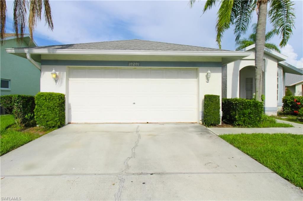 Photo of 10201 Regent CIR, NAPLES, FL 34109 (MLS # 226015360)