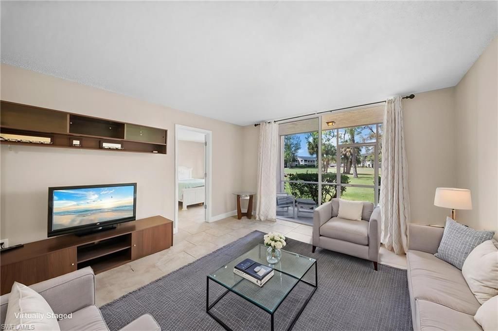 Photo of 170 Turtle Lake CT #109, NAPLES, FL 34105 (MLS # 226010317)