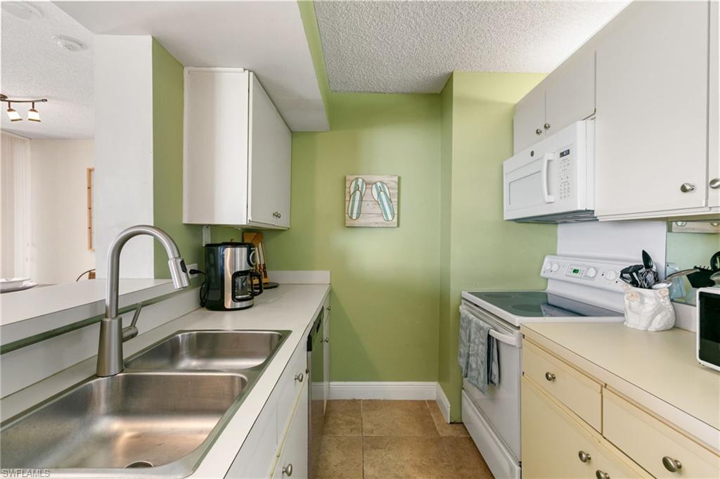 SANDCASTLE AT MARCO BEACH - Residential