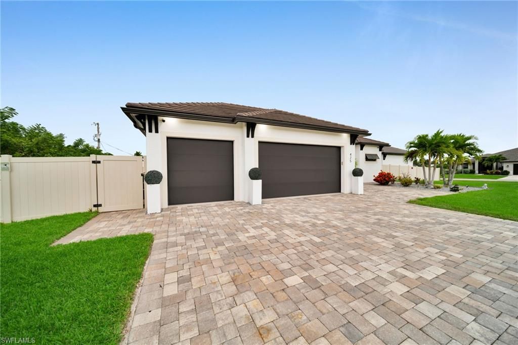 Photo of 425 SE 15th ST, CAPE CORAL, FL 33990 (MLS # 225082908)