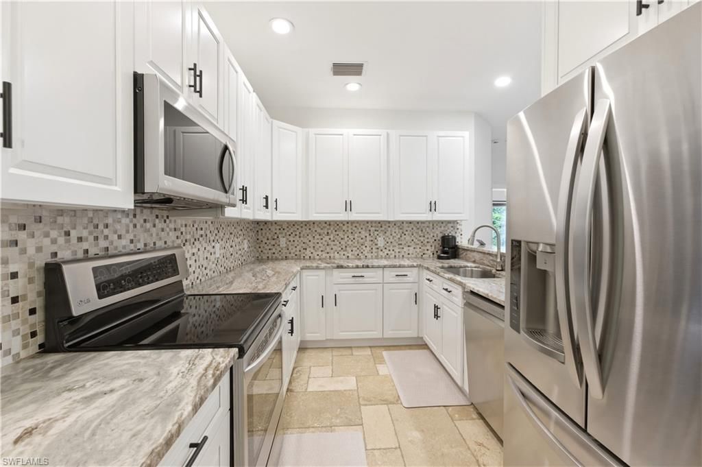 Photo of 415 Crossfield CIR #81, NAPLES, FL 34104 (MLS # 226013800)