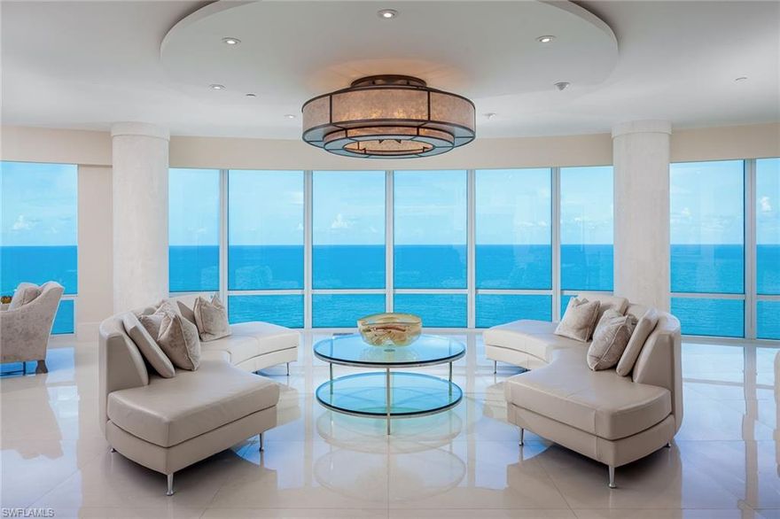 Nestled on the sugary sand beaches of the Gulf of Mexico, Naples is a world-class destination. Koastal Design Group, Kira Krumm & Co. has transformed Estate Fifteen South of the Regent into a modernist showplace. The masterfully crafted interior, encompassing approximately 8,600 sq. ft. of modern luxury with a luminous open floor plan, greets you as you enter this spectacular residence with breathtaking panoramic views of a Gulf Coast horizon. A sleek limestone bar with backlit Honey Onex slabs creates a subtle ambiance. The extensive Lutron Lighting and Sonos Sound Systems together with the secluded home theater make for a sensational auto/video experience. Sit back and enjoy the view from the sunset lounge. The family room exudes warmth in the casual space with a cozy gas fireplace alongside the spectacular gourmet kitchen. The master suite is situated with direct Gulf views and spacious dual baths. There are two private guest suites, along with a guest cottage complete with a full kitchen, two bedroom areas and its own private lanai with views overlooking the incredible waters of the Venetian Bay. Regent has the utmost in amenities, privacy and security.