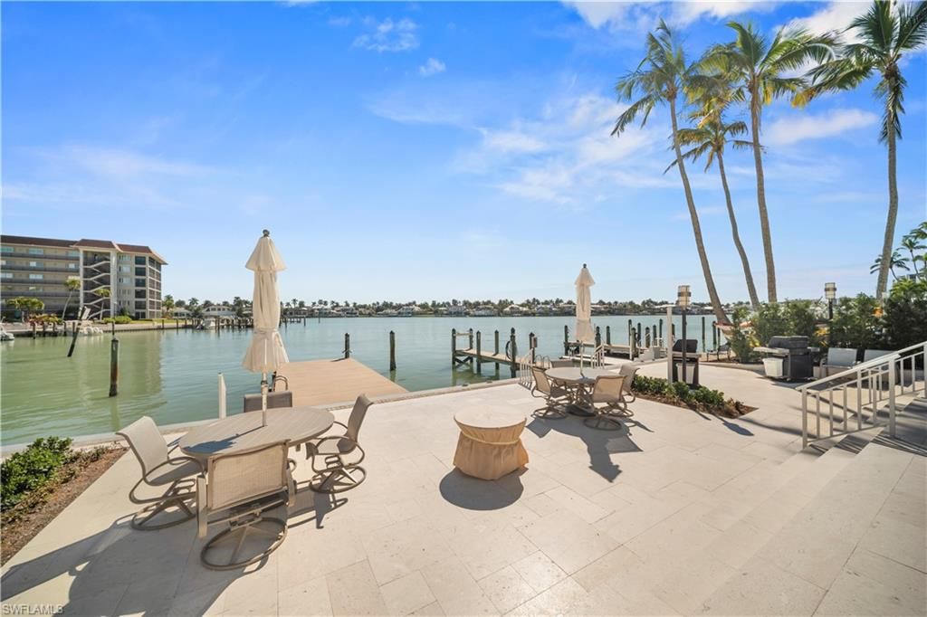 Photo of 2850 Gulf Shore BLVD N #108, NAPLES, FL 34103 (MLS # 226008551)