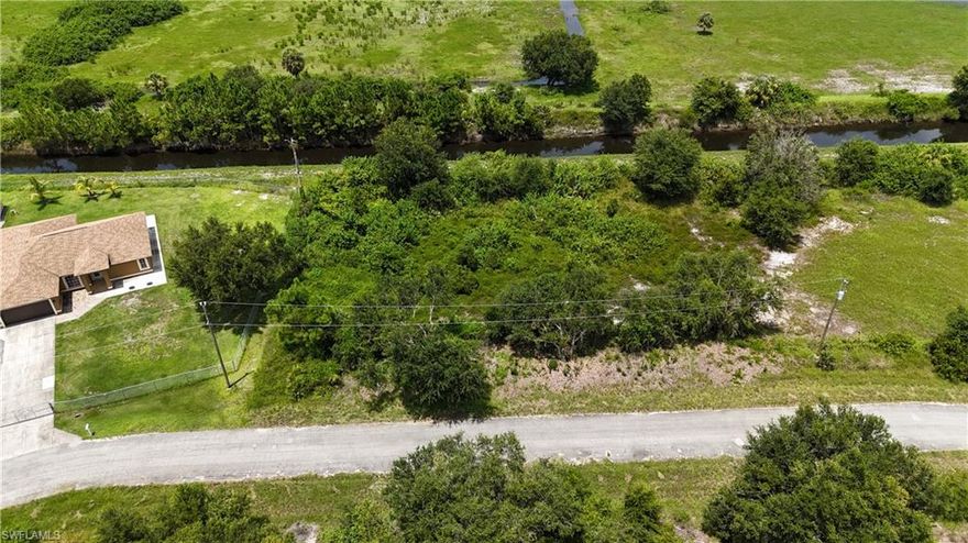 Looking to build a new construction home in a quiet neighborhood off the main road Look no further! Enjoy your oversized .28 Acre - 12,502 Sq off the main road great for your family and friends to enjoy for years to come. 
Close to Lehigh Acres and or State Road 82, enjoy the convenience of local schools, grocery stores, parks , entertainment and much more! Come take a drive and see for yourself why this is a perfect location for your family to build their dream home on!