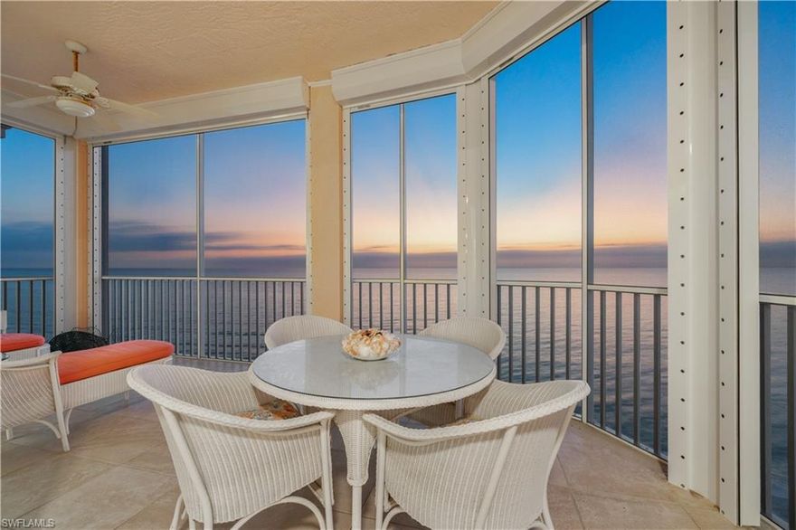 Direct Beachfront END-UNIT PENTHOUSE in North Naples’ coveted “Barefoot Beach Club!” Experience endless beach views allowing for breathtaking sunsets from your expansive wraparound Gulf-front lanai, as well as stunning views of the sunrise over the bay. This coastal condo features hurricane impact windows and sliders, electric hurricane shutters, and a spacious open floor plan with 2,003 sq ft of living space. It includes 3 bedrooms, 3 bathrooms, extra-high ceilings exclusive to penthouses, and water views from nearly every window. Enjoy extraordinary natural light courtesy of the extra windows only available in a rare end-unit. The spacious kitchen offers white cabinetry, generous storage, and an eat-in area with stunning bay views & adjacent wet bar with wine fridge in the living room. The well-designed split floor plan ensures privacy and comfort, with two guest bedrooms located at the front of the unit, while the primary suite is positioned on the Gulf side offering a peaceful retreat with breathtaking views. The primary suite features private lanai access, an expansive walk-in closet, and a spa-like bathroom with dual vanities, a large shower, and a separate soaking tub. Nearby to the NEW CLUBHOUSE with state-of-the-art fitness center & resort-style pool. Barefoot Beach residents enjoy 3 miles of beach, 2 pools/spas, manned/gated entry, on-site mgmt & dual elevators in building 260. OPTIONAL “Club at Barefoot” offers tennis, 2 restaurants & beachside food/bev/chair service. Excellent Collier County location minutes to Mercato, Waterside & easy access to RSW Airport.