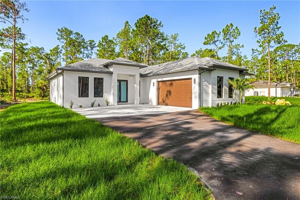 Photo of 3225 43rd AVE NE, NAPLES, FL 34120 (MLS # 226018059)
