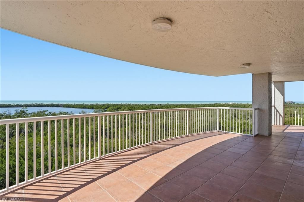 Photo of 6849 Grenadier BLVD #701, NAPLES, FL 34108 (MLS # 225077490)