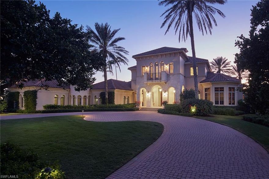 Immediate Grey Oaks Full Golf Membership Available! This extraordinary former estate model is in the exclusive Estuary at Grey Oaks community on a serene, private .75-acre homesite with lake and double fairway views of the Estuary golf course. The classic exterior architecture includes extensive precast stone, a private motor court with four-car garage and an opulent classical garden with fountain. The five-bedroom, six-and-one-half-bath home has a dramatic soaring two-story foyer, elegant ceiling detail throughout and neutral marble flooring. Designed for entertaining, this custom estate home features a private media room and a fantastic outdoor living space with covered screened-in lanai with stone gas fireplace, summer kitchen with bar and an infinity-edge pool and spa all overlooking one of the best lake and golf course views in all of Grey Oaks. Additional features include a luxurious main suite with dual baths, whole-home generator, climate-controlled wine cellar, gourmet-equipped kitchen with butler's pantry, private elevator and a spacious, detached cabana guest suite. A world of luxury awaits you in Grey Oaks just minutes from the world-class dining, shopping and beaches of Old Naples. The award-winning Grey Oaks Country Club includes three 18-hole championship golf courses, two elegant clubhouses, an incredible lagoon beach-entry pool, indoor and outdoor restaurant and bar, pickleball and tennis center, golf training facility, and a lavish 30,000-square-foot health and wellness center.