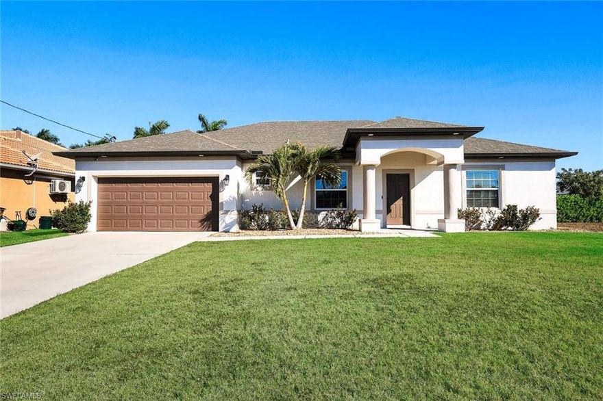 Located in Northwest Cape Coral, this 2018-built residence offers a sophisticated blend of modern design and functional living. Featuring three bedrooms plus den and two bathrooms, the interior is defined by an open-concept great room layout with durable tile flooring in the main living areas and a versatile den perfect for a home office, hobby area, or quiet retreat. The home is centered around a gourmet kitchen finished with granite countertops, large pantry, and stainless steel appliances. For more formal occasions, the home includes a dedicated dining room, providing an elegant setting for hosting dinner parties and holiday gatherings.  Relax in the oversized primary bedroom, complete with an huge walk-in closet and a spacious bathroom featuring an open-concept shower.  The living space transitions seamlessly to the outdoors, where a large screened lanai serves as a private sanctuary for relaxation and entertainment. This outdoor area features a heated pool and spa package with sunshelf, fully enclosed within a cage to ensure year-round enjoyment of the Florida weather. Exceptional attention was paid to the outdoor kitchen space, which includes an expansive setup equipped with a professional-grade griddle, a beverage refrigerator, granite countertop, and sleek stainless steel storage cabinetry. Additional upgrades include whole-house reverse osmosis system, irrigation system, stylish lighting fixtures, wood apron window sills, fence, gutters on all sides, epoxy garage floor, and EV outlet.  Experience the peace of mind of newer construction paired with premium details. This home is well positioned in a highly desirable area, offering easy access to the upcoming Seven Islands project, neighborhood parks, and the convenient Burnt Store Road corridor.