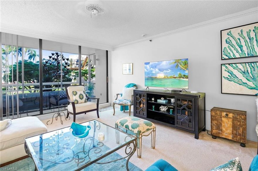 Unforgettable sunsets and prime Naples living await in this beautifully appointed Lucerne residence. Designed for both comfort and style, this two-bedroom, two-bath spacious layout includes formal living and dining areas, a charming breakfast nook, and a wet bar—perfect for everyday living and effortless entertaining.
Both the expansive primary suite and inviting guest suite open onto private terraces, blending indoor and outdoor living. Residents of Lucerne enjoy a host of premium amenities, including under-building parking, private storage, a bayside pool, grilling area, social room, secure lobby, and a full-time on-site manager. Deeded beach access just across Gulf Shore Boulevard provides immediate entry to Naples’ pristine shoreline.  Ideally located just steps from the beach and less than a quarter mile from the upscale waterfront dining and boutique shopping of Venetian Village, 3100 Gulf Shore offers one of the most desirable addresses in Southwest Florida. Often regarded as the “Crown Jewel” of Naples, this exceptional location and just minutes from downtown Naples and Fifth Avenue is where you want to be! The Moorings area provides for walking, jogging or a leisurely stroll while taking in picturesque views reminiscent of coastal Italy—this is truly coastal living at its finest.