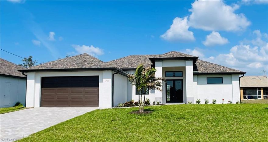 Brand new construction almost r ready to move in the growing NW area of Cape Coral. This immaculate home welcomes you with its 14" High entry way. The home offers an open floor plan with tray ceilings. This house comes with 24x24 porcelain tile throughout the house,  42" wood cabinets with soft closing hinges and modern acrylic finish, quartz countertops with waterfalls on both side of the island, Quartz in bathrooms and window sills as well. Pavers on the driveway, lanai and garage floor painted with epoxy paint. Don't miss the opportunity to own a property in paradise. Pictures are from previous finished model and finishes may vary.