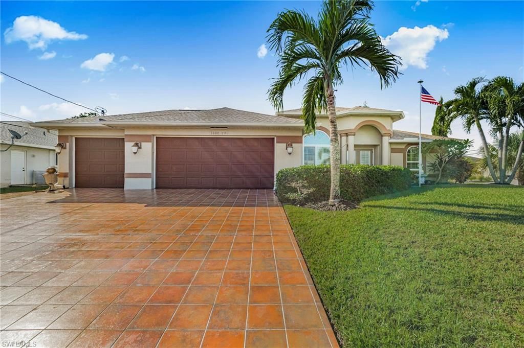 Photo of 1422 SW 16th TER, CAPE CORAL, FL 33991 (MLS # 2025017661)