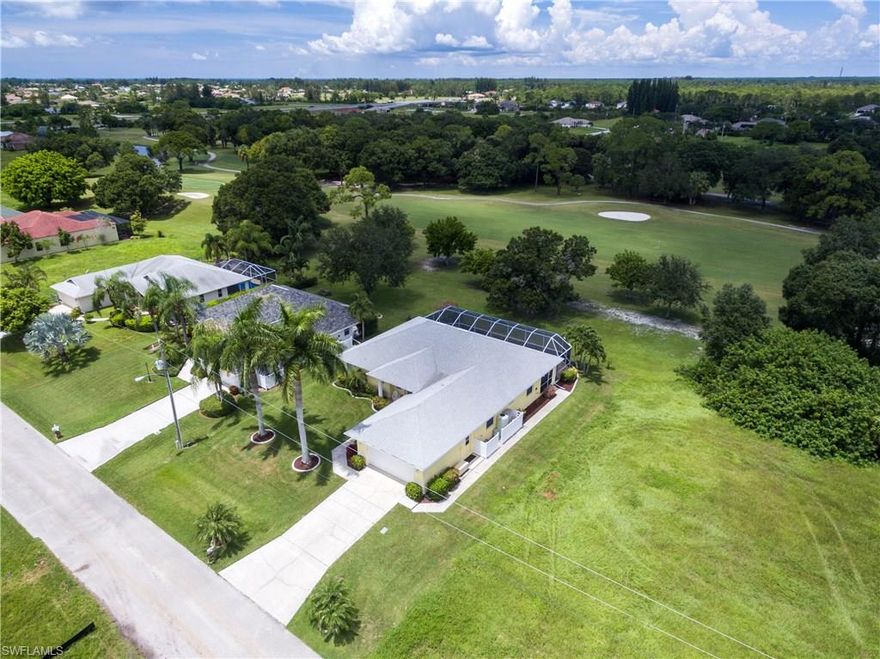 Meticulously Maintained Pool Home w/ Golf Course View! Located on the 7th fairway (with view of 7th & 9th) of the Coral Oaks Golf Course, this home offers almost 2,000sf of living space with a Great Room and Split Bedroom Design. From the first step through the French door front entry accented with a transom window, you will love the open feel of the home created by the cathedral ceiling, tile flooring, Open Concept Kitchen and the large sliders that lead to the Pool Lanai. Not only does the home have an entire home reverse osmosis system and a generator, but just this month the owner had a new 5 ton 14 sear day and night A/C installed. The Kitchen has been updated w/ white cabinets and granite countertops, plus the exterior of the home has just been painted. A spacious 58' screened lanai spans the entire width of the home and features a large under truss area, pavers , and heated sports pool. Lush landscaping surrounds the entire home- Royal Palms, Bougainvillea, Night Blooming Jasmine, Crepe Myrtle, and Gardenias.  The 2 Car Garage has 6ft added to both the width & depth, providing plenty of storage space. Coral Oaks Golf Course is a quiet non-gated family oriented community.