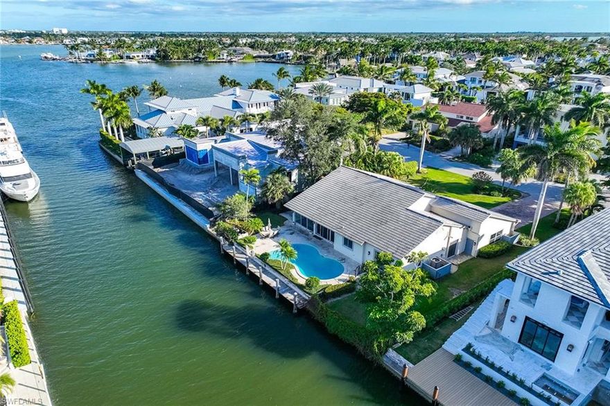 A premier waterfront opportunity in Aqualane Shores, just two homes from the Bay in coveted Crayton Cove and an easy walk to Naples’ renowned white-sand beaches. Positioned on a quiet street and surrounded by high-value newer estates, 675 15th Avenue South offers exceptional upside as a redevelopment or new-construction investment. The property provides direct Gulf access within minutes, making it ideal for boating enthusiasts and luxury buyers alike. Steps from the acclaimed dining, shopping, and galleries of Third Street South, this premier location delivers enduring value, strong demand, and the ultimate Naples coastal lifestyle. An outstanding opportunity to build, reimagine, or invest in one of Naples’ most prestigious waterfront enclaves.