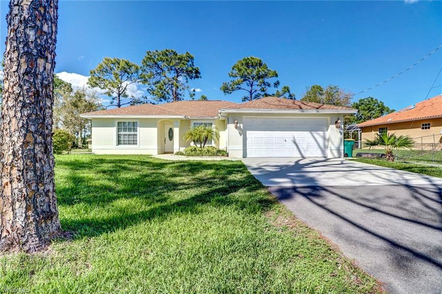 This 3 bedroom, 2 bath home sits on 1.59 acres in the highly sought after Golden Gate Estates area. This home has great curb appeal, asphalt drive way and excellent neighbors. This is a perfect home with tons of cabinets and lots of storage space.The kitchen is a great size with breakfast bar and a connecting family room so you can cook and entertain! This Charming home has a big master bedroom with 2 closets and on suite. TWO great schools are just down the road. The area is quiet and peaceful and right around the corner from the new Publix shopping plaza and other conveniences. You do not want to miss out on this Amazing price and perfect home! FHA/USDA APPROVED! MOTIVATED SELLERS!