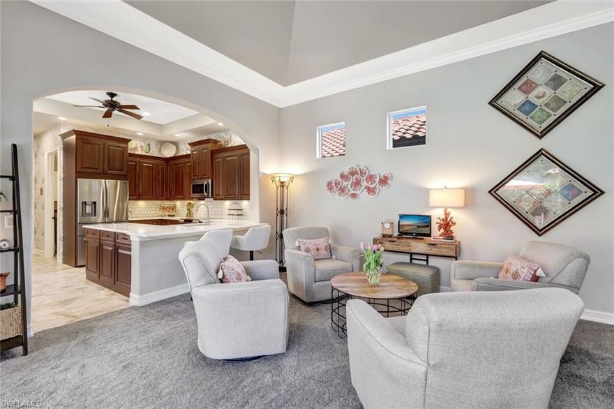 NO WAIT LIST FOR A GOLF MEMBERSHIP! Welcome to Wildcat Run Golf & Country Club in Estero. This charming courtyard-style residence offers exceptional privacy and comfort, featuring a whole-house generator (excluding the pool pump) and a private detached cabana guest suite with one bedroom and a full bath, ideal for visitors or extended stays. Designed for both comfort and privacy, the home centers around a screened-in courtyard with a heated pool and spa, ideal for relaxing or entertaining year-round. Inside the main residence, you’ll find a spacious great room, two bedrooms, two bathrooms, and a two-car garage. The kitchen is well-appointed with stainless steel appliances, marble countertops, a pantry, and ample workspace for everyday living and entertaining. The expansive primary suite opens directly to the screened-in courtyard through triple doors and includes dual walk-in closets, a comfortable sitting area, and a spa-like bath with dual vanities and a large walk-in shower. A secondary guest bedroom enjoys its own private screened-in lanai overlooking the lushly landscaped backyard. Residents of Wildcat Run enjoy access to exceptional amenities, including an 18-hole Arnold Palmer Signature golf course, Har-Tru tennis courts, bocce, pickleball, a modern fitness center, and two on-site dining options. This is a rare opportunity to enjoy luxury living, resort-style amenities, and an active lifestyle all in one remarkable community.