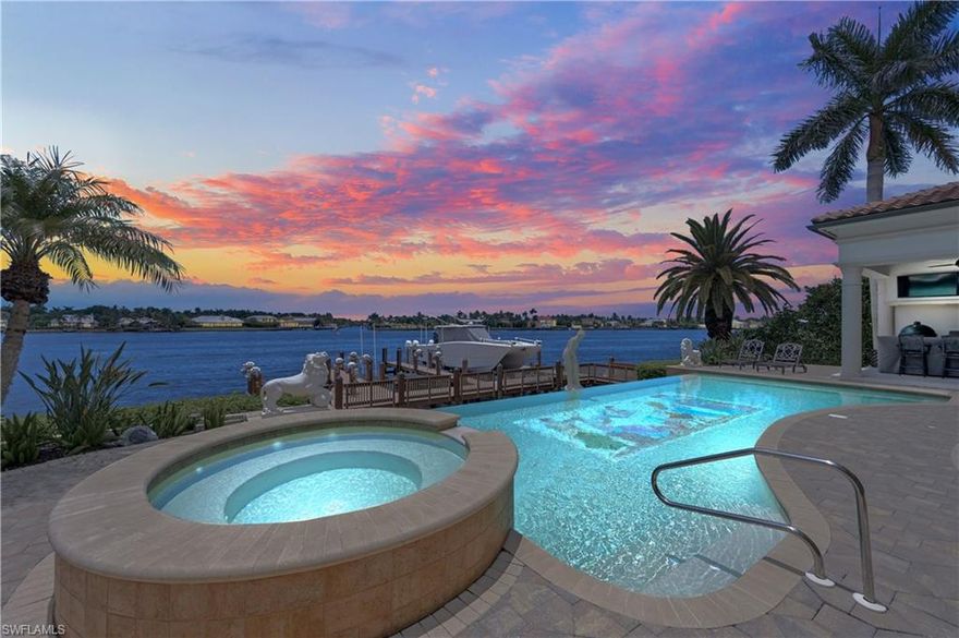 Experience the epitome of luxury living with unparalleled vistas in Naples. This stunning property boasts panoramic views of Naples Bay with a direct western orientation, offering breathtaking sunsets every evening. Enter through mahogany doors into an expansive open-concept layout, where every window showcases the beauty of the water. This multi-million dollar transformation is brimming with top-tier upgrades, including a luminous and modern kitchen outfitted with Wolf and Sub-Zero appliances, a multi-chandelier lighting package, natural wood ceilings, plantation shutters, marble flooring, and a brand new roof completed in 2024. Enjoy the convenience of a four-level elevator, with a 1st-floor Master Suite that features a brand new bathroom and custom walk-in closet. The mid-level houses a fully equipped gym, a second laundry room, and a guest suite. The 3rd floor offers a walk-out balcony, a junior master suite, a study, a second kitchen, and another guest room. Ascend the spiral staircase to the top floor and marvel at the 360-degree views from the private rooftop deck. Outdoor living is a delight with a negative-edge pool/spa, an outdoor kitchen, multiple TVs, and more. Boating enthusiasts will appreciate the three new boat lifts and the easy, no-bridge access to the Gulf of Mexico. This home is a perfect blend of luxury, comfort, and breathtaking views, offering an exceptional lifestyle in Naples.