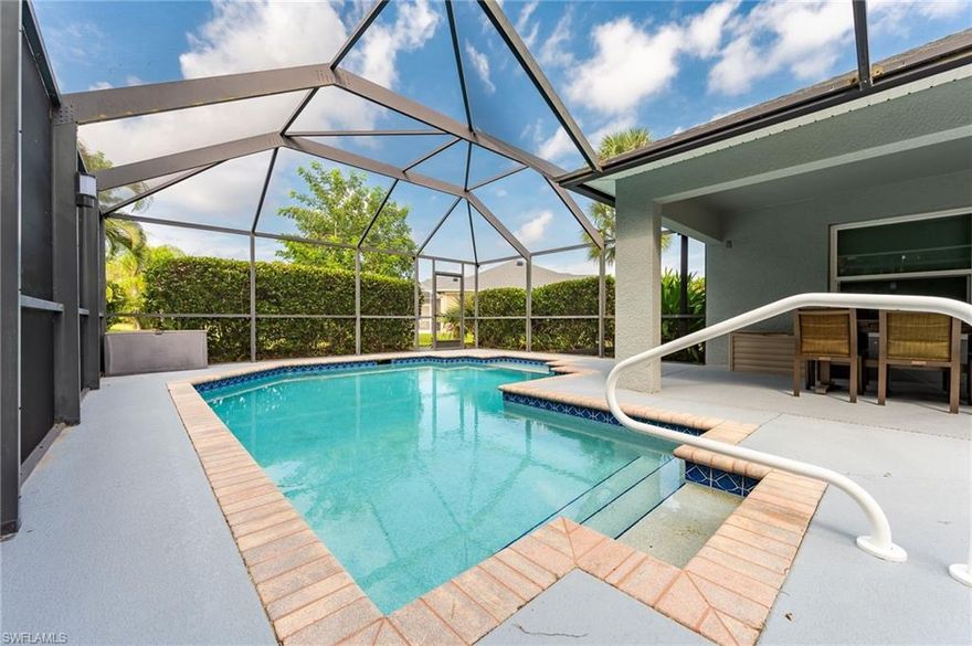 This three car garage home with a heated pool in Calusa Palms is priced to sell! All the major components have recently been replaced so the new homeowner can rest easy. The roof was replaced in 2023 along with a solar attic fan. The A/C unit was replaced in 2022, new driveway pavers were installed in 2021, impact windows were installed in 2018 along with accordion shutters to protect the sliders leading to the pool. Enjoy the location with shopping and beaches nearby or stay home and enjoy the community amenities (community pool, clubhouse, tennis court/pickle-ball court, bocce court) with low HOA fees and no CDD fee.