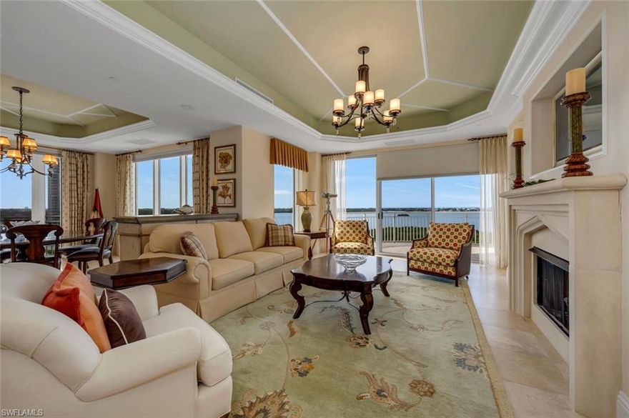 C14078 This spectacular home offers breathtaking panoramic views of the Gulf of Mexico, Estero Bay and the Bonita Bay golf courses. Start your day with mesmerizing morning sunrises and end it with stunning sunsets. Upon entering through the private elevator lobby, you'll be greeted by a spacious and open living room and dining area with wide water views. The comfortable and cozy family room/media room, with attractive bar, features extended floor-to-ceiling glass, allowing for abundant natural light. The large kitchen with center island is perfect for any gourmet chef. Additionally, this versatile space provides a morning room for “breakfast/coffee with a view”. There are three terraces. The west facing terrace has a built-in electric grill for your outdoor entertainment and relaxation. There are 3 en-suite bedrooms and 3 1/2 baths. The den can easily be converted into a fourth bedroom if needed. This residence boasts a second floor PRIVATE & ENCLOSED TWO-CAR GARAGE, adding exceptional value and extra storage. Don't miss out on the opportunity to own this exceptional residence in Bonita Bay.