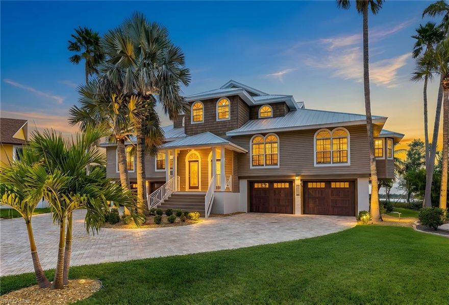 Welcome to this ultimate waterfront duplex paradise on Fort Myers Beach! Nestled at the end of a quiet cul-de-sac along stunning Estero Bay, this extraordinary property delivers an impressive 4,400 square feet of thoughtfully designed living space across two mirror image residences. Each side of this remarkable duplex features 3 spacious bedrooms plus a versatile den or bonus room, accompanied by 4 bathrooms, perfect for accommodating family, friends, or lucrative rental guests. This property sits on a weekly rental street, making it a dream investment opportunity. Enter and discover stunning custom upgrades throughout, including quartz countertops, oversized kitchen islands with cooktop and custom hood, separate wet bars, and tons of built-in storage. Vaulted ceilings and elegant tile flooring create an airy, coastal atmosphere, while a durable metal roof provides lasting peace of mind. The outdoor living is where this property truly shines. A resort-style pool and spa anchors the backyard oasis, surrounded by generous covered seating areas and extra outdoor living space. Two oversized lanais frame breathtaking bay views, and an upper-story balcony off the bedrooms offers a private retreat above it all. Boating enthusiasts will love the bayfront dock, ready to accommodate a large vessel. Practical perks include an oversized 4 stall garage with ample room for extra toys and storage. Conveniently located at the south end of Fort Myers Beach close to shopping, restaurants, sugar white sand beach, Lovers Key State Park and more. Schedule your showing today!