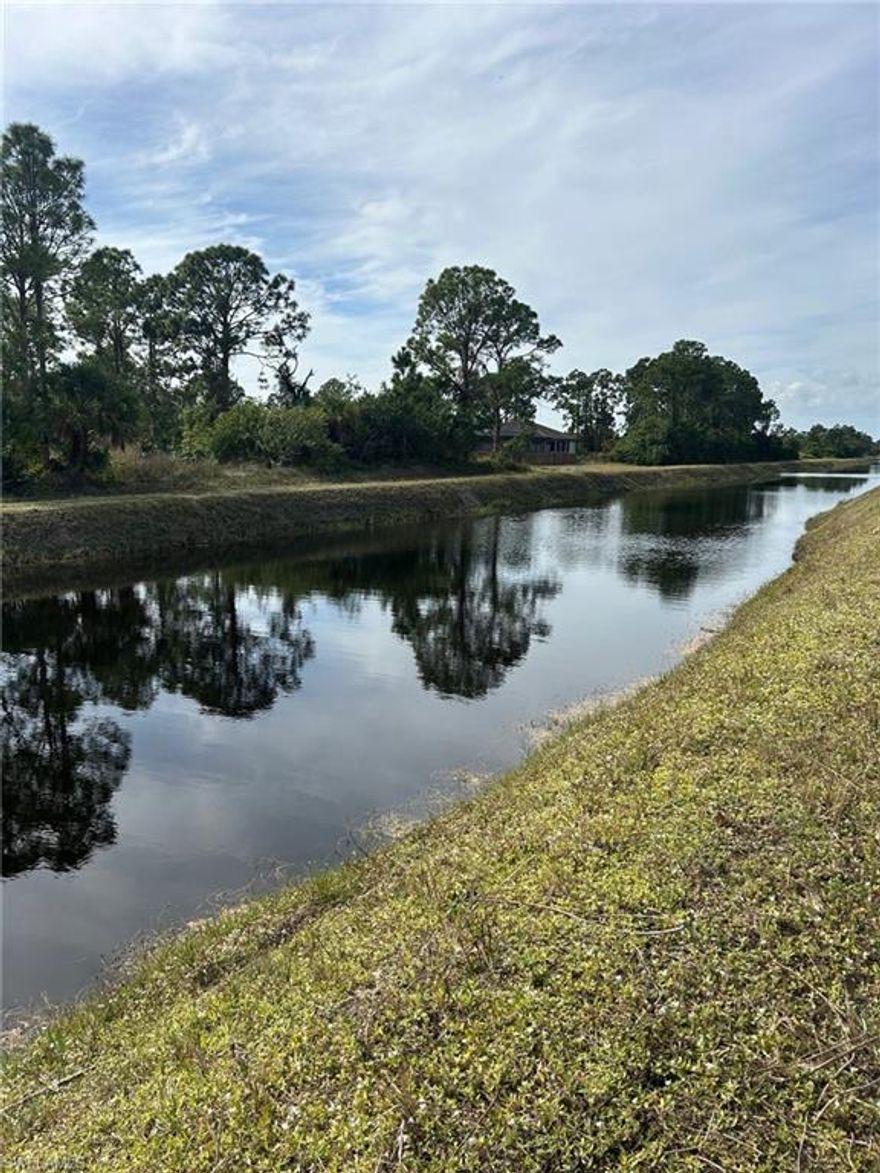 Opportunity Knocks!
Don’t miss this rare chance to own side-by-side canal-front lots with desirable southern exposure. The adjacent western lot (MLS #2025025131) is also available, offering the flexibility to build two separate homes on a wide canal or combine both parcels into one impressive half-acre homesite. Located just north of State Road 82, these lots sit in a quiet, established neighborhood while still offering quick access to major roads, shopping, and amenities. Electric is available at the curb, making this an attractive option for builders, investors, or buyers planning future construction. 
Low taxes, local sellers, and quick responses with fast closings make this an easy decision.
Not an assignment of contract.
Buy now and build in this peaceful yet conveniently located area!