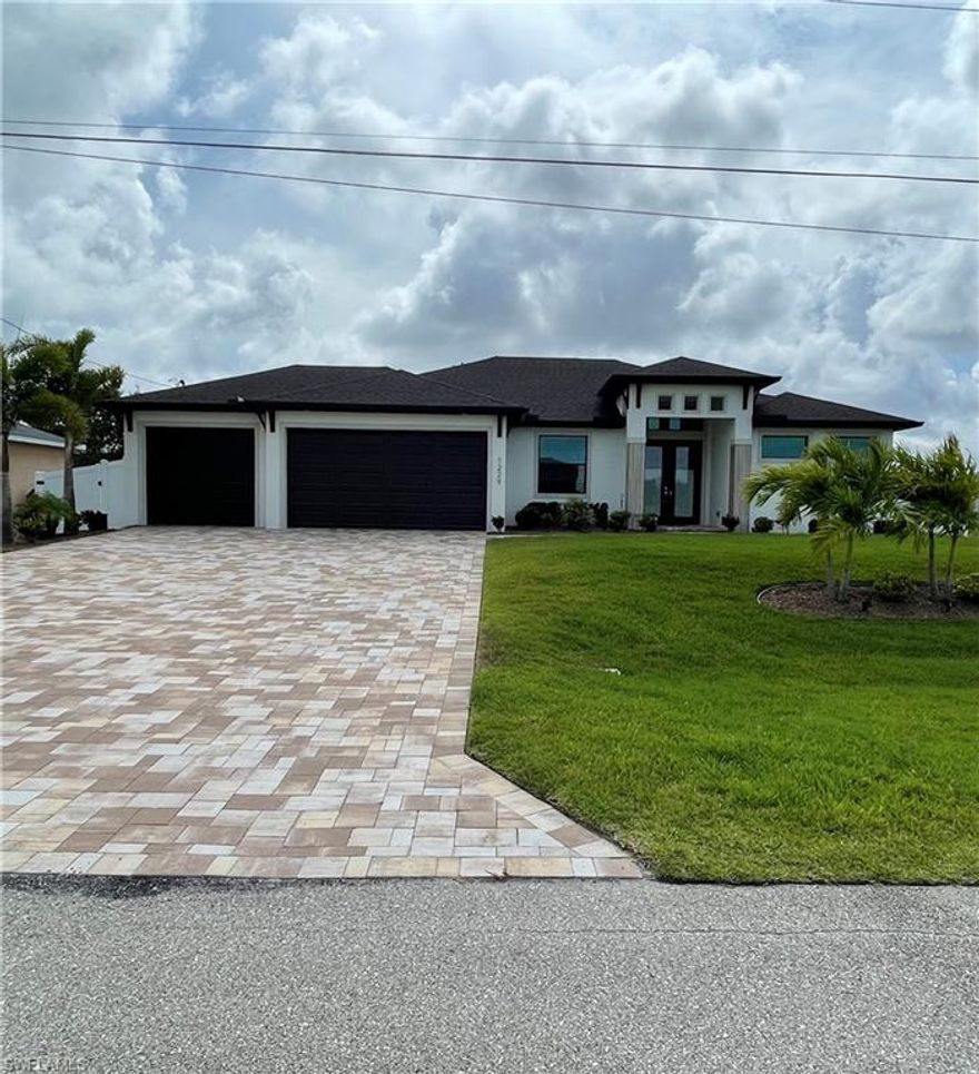 Stunning SW Florida Home at it's finest! Enjoy the rear eastern exposure morning sun with shaded evening pool relaxation! Features 3 bedrooms, Den, 2 full bathrooms, 3 car garage with epoxy floor and pull down screen for large door, over 1800 sqft of living space, 6 ceiling fans, outdoor kitchen, pool with heater, fenced yard, whole home reverse osmosis, and MUCH more. The living area is bright & open to the lanai. The kitchen features custom cabinetry, stainless steel appliances, a large island with breakfast seating, granite counters, and a walk in pantry. The bedrooms are large in size and offer plenty of storage and closet space. Don't miss this amazing opportunity!