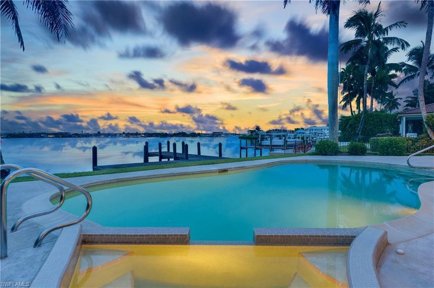 180-degree panoramic views of Naples Bay! Luxuriate yourself in the sun-drenched backyard provided by a desirable western exposure. Imagine breath-taking sunsets, fireworks from Naples Pier on July 4th and News Years eve, watching dolphins play, sailboats racing, with boaters passing by, all from your own back yard. Well maintained landscaping w/ soaring Royal Palms. Boaters will enjoy the low wake, no-bridge, direct access to the Gulf of Mexico. Dolphin Court is a private street w/ minimal traffic located in the highly sought-after community of Royal Harbor. Located only minutes to downtown 5th Avenue, 3rd Street, Naples Pier, & Naples beaches. This is a piece of paradise you'll just have to experience for yourself!