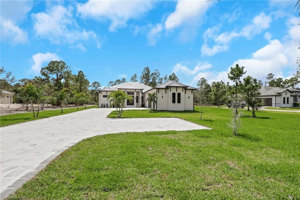 Photo of 408 24th AVE NE, NAPLES, FL 34120 (MLS # 226011361)