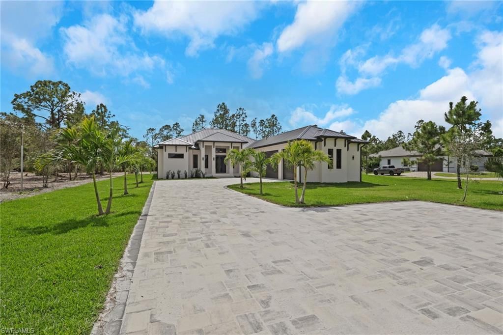 Photo of 408 24th AVE NE, NAPLES, FL 34120 (MLS # 226011361)