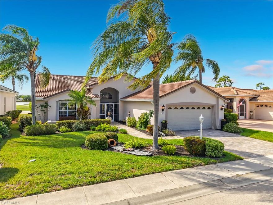 This beautifully customized Custom Ibiza POOL home in HERONS GLEN GOLF AND COUNTRY CLUB sits on one of the MOST COVETED LOTS in the community, with sweeping views of the golf course, large lake, the clubhouse, and the driving range right from your own back lanai. From the moment you arrive, the paver driveway and screened front entry with art glass in the front door set the tone for the quality you will find throughout. Step inside to find IMPACT GLASS sliding doors in the living room that disappear behind the wall and a FIREPLACE that makes the space feel warm and inviting. The home has hard flooring throughout with no carpeting, and tile in the main living areas. The spacious dining room sits just off the kitchen and features a built-in electric fireplace, adding ambiance to everyday meals or entertaining. FRENCH DOORS from the dining room lead to the FLORIDA ROOM, where two walls of glass sliders open fully to the LANAI creating a seamless flow between indoor and outdoor living. The covered and caged lanai with newer SUPER SCREEN features a POOL with jets, a waterfall feature, and a 2024 pump. The kitchen is a joy to cook in, with GRANITE countertops, a double sink, a breakfast bar, extra cabinetry drawers, and stainless appliances including a DOUBLE DOOR OVEN. The enclosed DEN offers double doors and tile plank flooring, making it an ideal home office or flexible living space. The primary bedroom has a door directly to the lanai, and the fully renovated en suite bath is a true retreat, featuring a large sunny walk-in shower with a RAIN SHOWER head, beautiful tile, a FRAMELESS GLASS door, and a granite vanity with rectangular sinks. The guest bedroom is bright and comfortable, and the guest bath also features granite countertops and a rectangular sink. The separate laundry room includes a utility sink for added practicality. The home is well-equipped for Florida weather with a combination of electric and accordion hurricane shutters. Additional updates include a 2021 air conditioning system, a newer garage door, and a 2023 washer. The home is being sold FURNISHED, making this a true move-in opportunity. Living in Herons Glen means enjoying a vibrant, active lifestyle in a gated community with tennis, pickleball, bocce, a fitness center, a resort-style pool, dining, and so much more. The championship golf course was recently ranked the second best in Florida by Golf Advisor, a well-deserved honor for a course that residents get to enjoy year-round. With this home, this view, and this community, Southwest Florida living doesn't get much better than this.