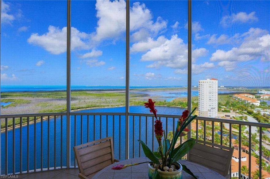 RARELY AVAILABLE - only 1 unit like this in the bldg. Daydream and escape into the PANORAMIC VIEWS that carry your gaze over a 25-acre, crystal clear lake, 700+ acres of preservation land (part of the Lee Co. 20/20 project) the Bay, Gulf, the islands of Estero & Sanibel and as far down as Bonita Springs and beyond. Situated on the 19th floor, this condo has soaring ceilings and high arched windows & sliders allowing the south & west light to come streaming in while allowing more of the view to be captured. Arrive by a secured elevator that opens into your condo’s elevator foyer. Double doors open into another foyer and lead your eyes out to the endless vistas of glistening water. The great room is open with an area for seating to watch tv or converse with guests while taking in nature’s watery stage and dining where you will always enjoy meals with a view. The kitchen has been opened-up so there are very few obstructions blocking the view even while doing meal prep. A bonus area off the kitchen can serve as a breakfast area, den, office or ‘keeping room’ where you can sit comfortably, surrounded by the view and interact with the family chef. 2 screened and tiled lanais – 1 off the dining area and the other off the living area provide spaces to entertain el fresco. The primary suite has a large window allowing you to enjoy the views from bed as well as access to one of the lanais. 2 walk-in closets are outfitted with organizers. The in-suite bathroom has a separate walk-in shower, and soaking tub, 2 sink vanities and a private water closet. Your overnight company will have privacy as the guest rooms and bathrooms are located away from the primary retreat. One guest room has an attached bath providing a secondary in-suite. A 3rd bathroom and 3rd bedroom complete the guest side of the condo. A generous laundry room with a deep soaking sink, cabinets and closet for additional storage makes day-to-day chores more convenient and enjoyable. A 2-car private garage on the 2nd level of the parking garage convey along with a large de-humidified storage area. Mastique is an island style resort community on 50-acres. A 6000+’ clubhouse, recently completely renovated, houses a fitness area with Precor equipment and free-weights, yoga studio, billiard & poker room, gathering space, dining area, kitchen and media / meeting room. A screened lanai provides an outdoor space to entertain free of bugs while another outdoor area is open and set up for dining. A resort style pool, with a salt-water system, and spa are situated on the edge of the lake. The lush tropical grounds include a resurfaced bocci court / putting area, grill areas, lakeside beaches, a mile-long shell path surrounding the lake, Zen garden, refurbished tennis and Pickleball courts, vehicle wash area and last but NOT LEAST a special designated park for your canine kids. Walk to the beach, restaurants, shops, grocery, bike to FMB and Sanibel. The perfect balance of view, privacy and location.