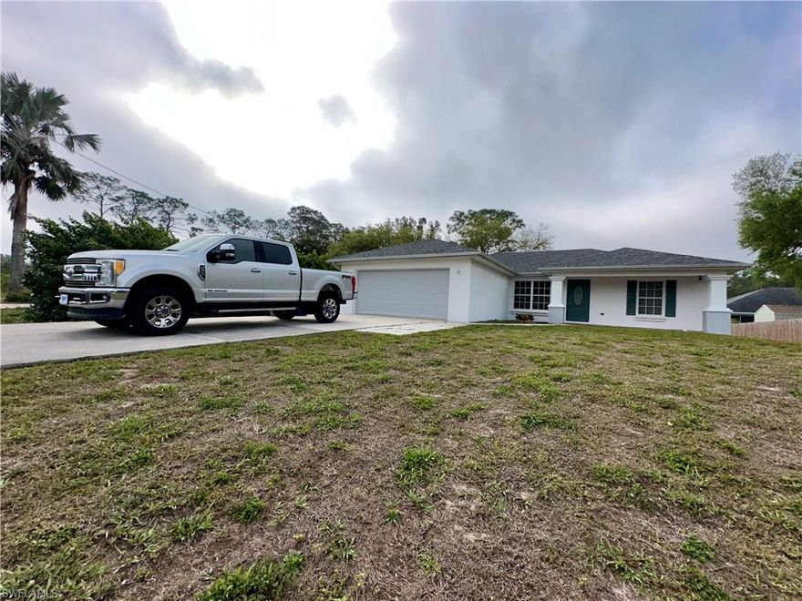 Come live in this house, with trees in the yard, a washer and dryer inside the house, in a quiet area with easy access to both downtown Fort Myers and Lehigh Acres.