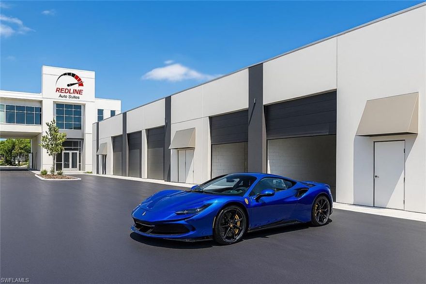 The Pinnacle of Automotive Luxury – Redline Auto Suites Units 1 & 2 - An unprecedented opportunity awaits the true connoisseur of automotive excellence. Units 1 and 2 at Redline Auto Suites are now offered for sale—with full architectural and interior design plans included to seamlessly combine both suites into a singular, state-of-the-art motor sanctuary. Envisioned with a floating mezzanine deck that spans both units, this is more than just storage—it’s a private gallery for your prized collection. Nestled within Naples' most elite motor condo community, Redline is a masterfully designed enclave of only 18 private auto suites, each crafted for those who live and breathe the car-culture lifestyle. This offering boasts approximately 2,000 square feet of open floor space, with the potential for 600 additional square feet of elevated loft space, perfect for a high-end lounge, office, or observation deck overlooking your personal fleet. The oversized 16’ wide x 14’ high roll-up garage doors welcome everything from supercars to custom transporters, while the interiors are delivered as a premium shell, ready to be transformed into your bespoke vision—whether that includes polished epoxy floors, glass-enclosed lounges, full bar and cigar humidor, or wall-to-wall automotive memorabilia. Each suite includes: (1) Pre-plumbed private restroom (2) Advanced HVAC with air-handler closet (3) Utility-ready water bib (4) 24/7 access and modern security infrastructure. Above the auto court, owners enjoy exclusive access to Redline’s Club Room—a dramatic, glass-wrapped lounge reminiscent of a speedway’s VIP grandstand suite. With panoramic views of the entire facility and curated social gatherings, the Club Room is a place where passion meets prestige. For the collector who demands more than just space—for those who seek experience, expression, and identity—this is your automotive sanctuary redefined.