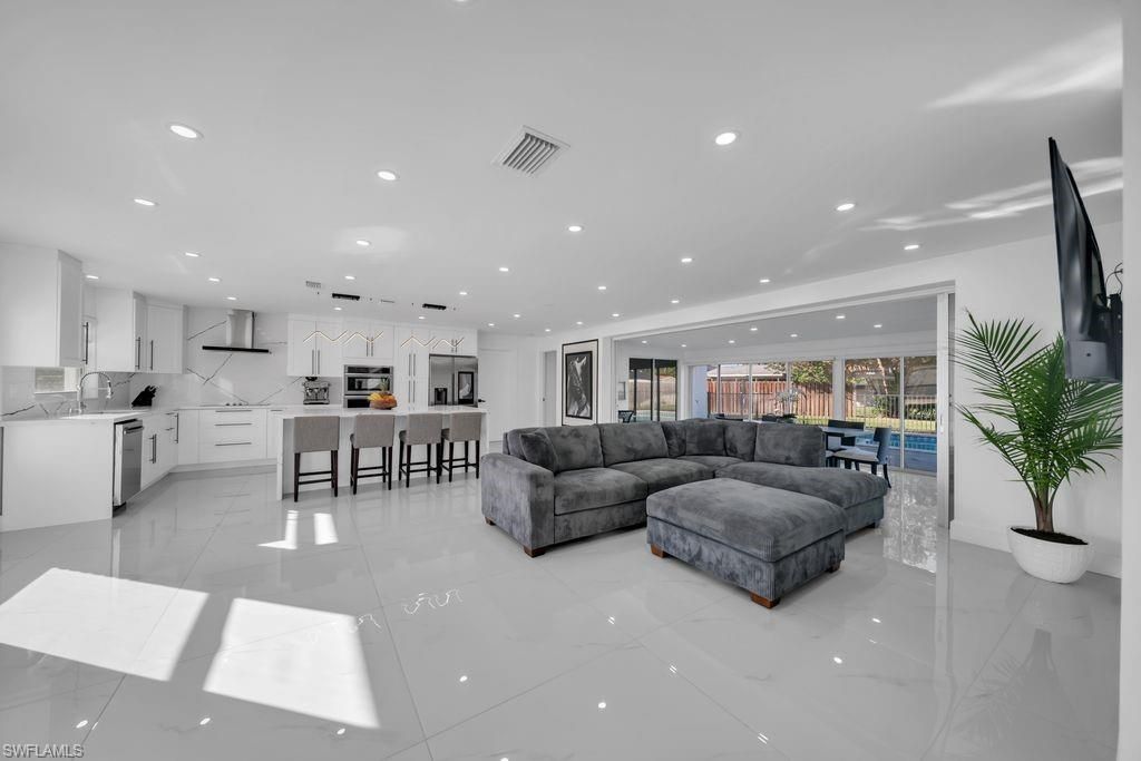 Photo of 261 Bayshore DR, CAPE CORAL, FL 33904 (MLS # 225083085)