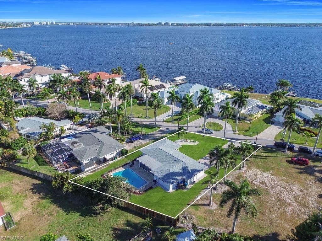 Photo of 261 Bayshore DR, CAPE CORAL, FL 33904 (MLS # 225083085)