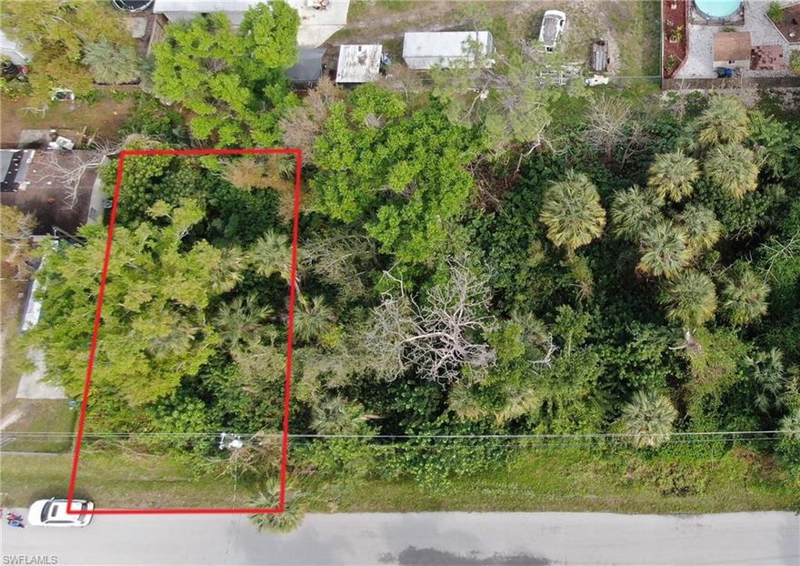Nice wooded, single-lot in Palmona Park. New construction across the street in a very quiet neighborhood. Close to shopping and restaurants with easy access to 41 and all that SW Florida has to offer! An inexpensive way to own a piece of paradise with fewer building and usage regulations than other lots. Great location for a starter home or mobile home with NO HOAs. The three lots to the east of this lot are also available.