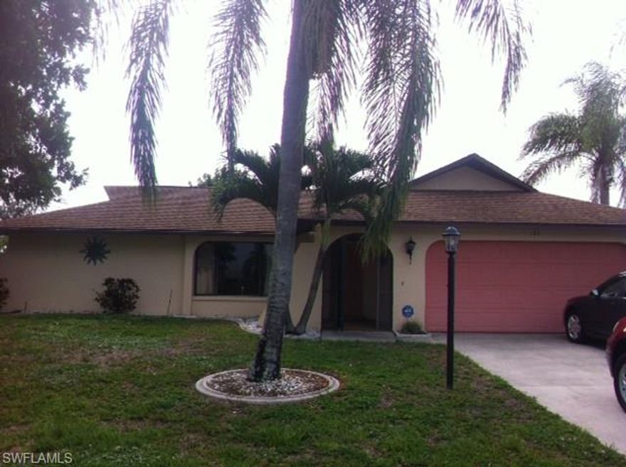 Charming 3-2-2 home on freshwater canal with wooden and concrete docks. Boat lift (up to 5600 lbs) Great Fishing, Great Location, and lots of Landscaping with concrete curbing!!!! Large screened brick paver front entry. Nice & bright, good floor plan. Large bay window in formal living room with family room off of dining area. Large pass-through to Lanai. Ceiling fan light fixtures in all rooms. Will not last, priced to sell!!!