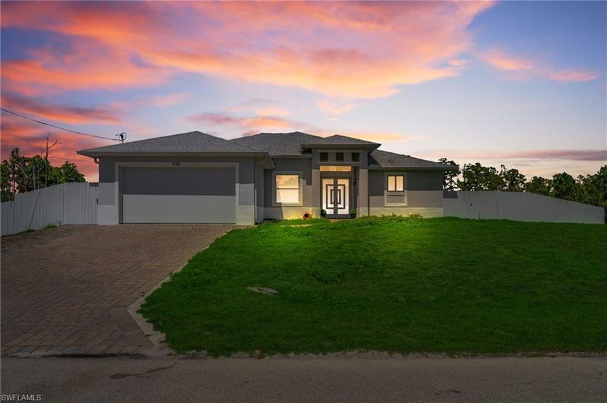 Stunning 3-bedroom, 2-bath home in a desirable area of Lehigh Acres offering luxury, privacy, and space on a rare oversized 0.6-acre fully fenced lot. This property features a sparkling private pool and an extended driveway with ample parking. Built for durability and peace of mind, it includes impact windows and doors throughout. Inside, enjoy tile flooring, a modern chef-style kitchen with beautiful cabinetry, a sleek quartz island, and high-end appliances. Custom-designed closets add both elegance and functionality. Step outside to an expansive backyard with endless possibilities—perfect for entertaining, outdoor living, or creating your dream oasis. A rare opportunity in a prime location.