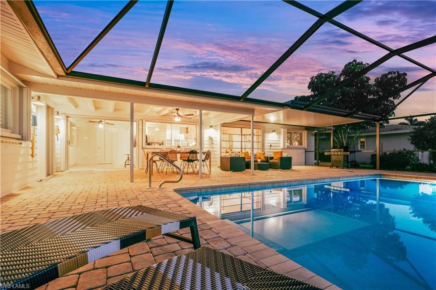 This WESTERN exposure  2 bedroom, 2 bathroom POOL home is an architectural classic that has been JUST remodeled and a NEW ROOF.  This GULF ACCESS home will have you to the Caloosahatchee River within minutes. NO BRIDGES. The interior of the home was designed by a European architect and comes FURNISHED.  It offers plenty of space and beautiful crown molding throughout. The living room comes with custom made in-built shelves.  Guest bedroom, hallway and guest bathroom are equipped with inbuilt cabinets. Even the garage offers lots of storage space with a custom made cabinet. The Owner’s suite has a walk-in closet and the ensuite bathroom has a bathtub and shower. Both bedrooms come with brand new beds, comforter sets and mattresses. The new kitchen opens to the dining area and offers a wide sliding window to service the SCREENED lanai and pool area. The pool is equipped with an electric pool heater, so that nothing stands in the way of swimming fun in any weather. Enjoy the sunset on your own boat deck with 14,000lb boat lift and captains walk. Flood insurance is transferable. Roof has GAF Golden Pledge Lifetime Warranty.  Don’t miss this one! Schedule your private showing today!