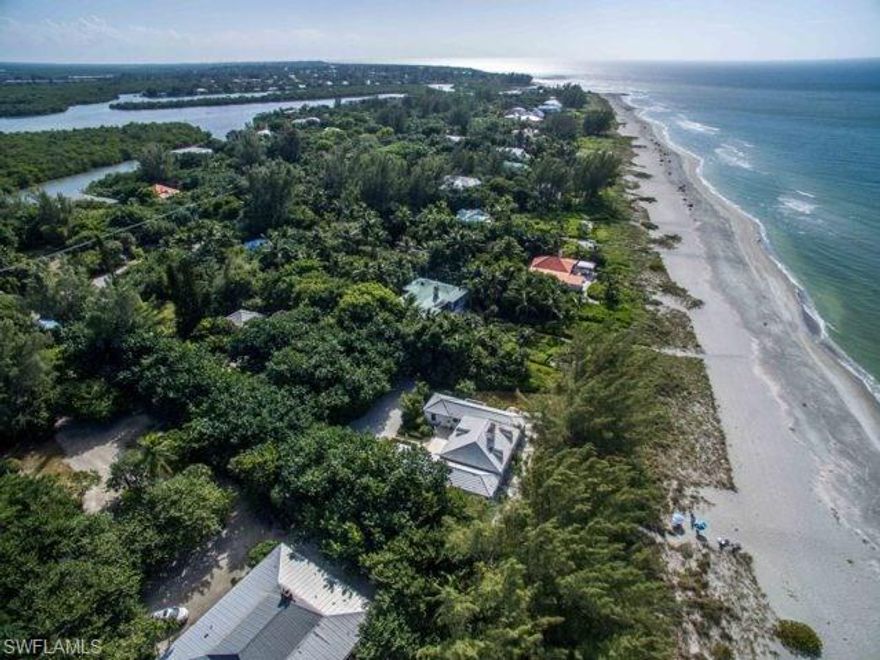 Captiva Gold Coast Estate direct beachfront w/123' of frontage. An exceptionally private and secluded setting highlights this truly charming Old Captiva dream location and lifestyle. An elegant and precious beach home from yesteryear sits amongst whistling pines and swaying palms offering a perfect backdrop for the direct sunsets served nightly. Gorgeous courtyard designed main residence with an equally lovely guest home are nestled within this idyllic and romantic setting. A very special offering.