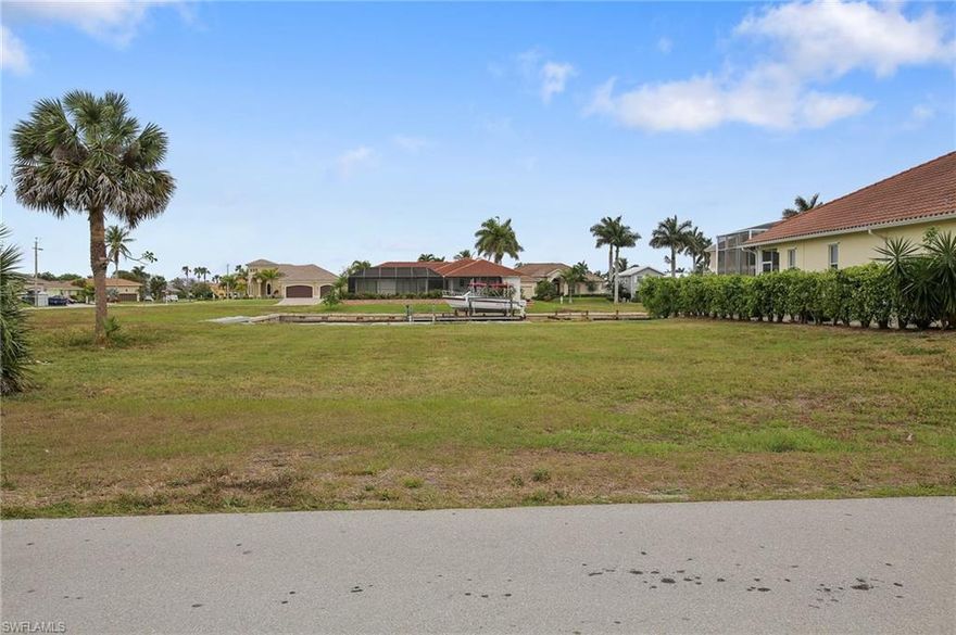 L.1779 - Own your piece of paradise! This indirect gulf access lot offers 82 feet on the water.The seawall was replaced in 2008.  Close to Mackle Park, YMCA, library and a short drive to the white sandy beaches of Marco Island.