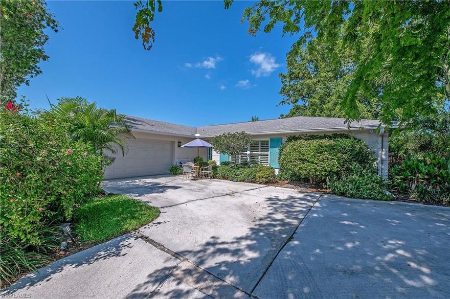 Beautiful LAKEFRONT home in the Lakewood neighborhood of Naples, Florida. SERENE AND SOPHISTICATED three bedroom home features formal living room, family room and formal dining room. Wide-plank flooring, crown molding, plantation shutters, designer light fixtures and wallpaper. Finely finished with solid core interior doors and hardware. The master bath ensuite is a spa-like retreat with a waterfall tile shower design, frameless shower door and walk-in closet; tastefully decorated with designer wallpaper and lighting. The kitchen opens to the family room and both can access the covered lanai for outdoor dining, relaxing and sunset views over a quiet, secluded lake. Ideal for entertaining. This beautiful home can be sold with or without the furniture. Close to the Kings Lake shopping center with a grocery store, restaurants and Starbuck's. Within three miles to Olde Naples and the pristine white sand beaches on the Gulf of Mexico.